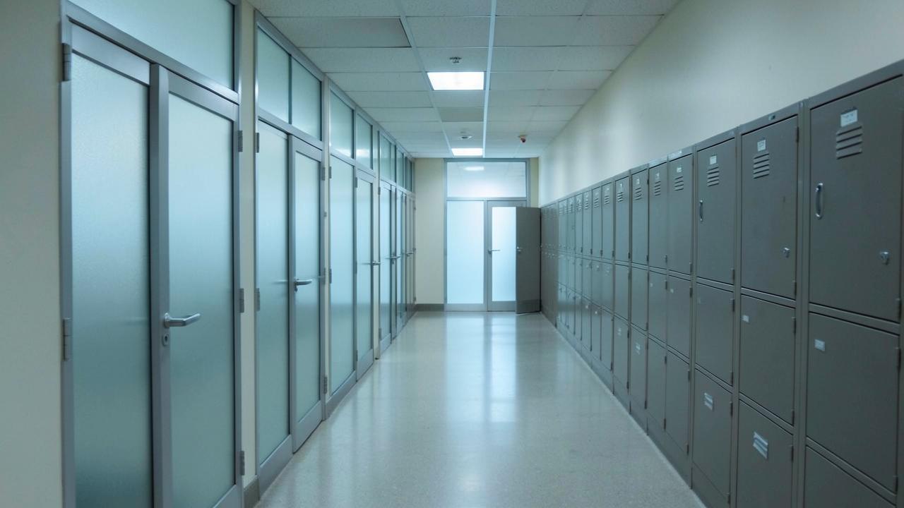 Government office corridor with frosted glass doors and filing cabinets